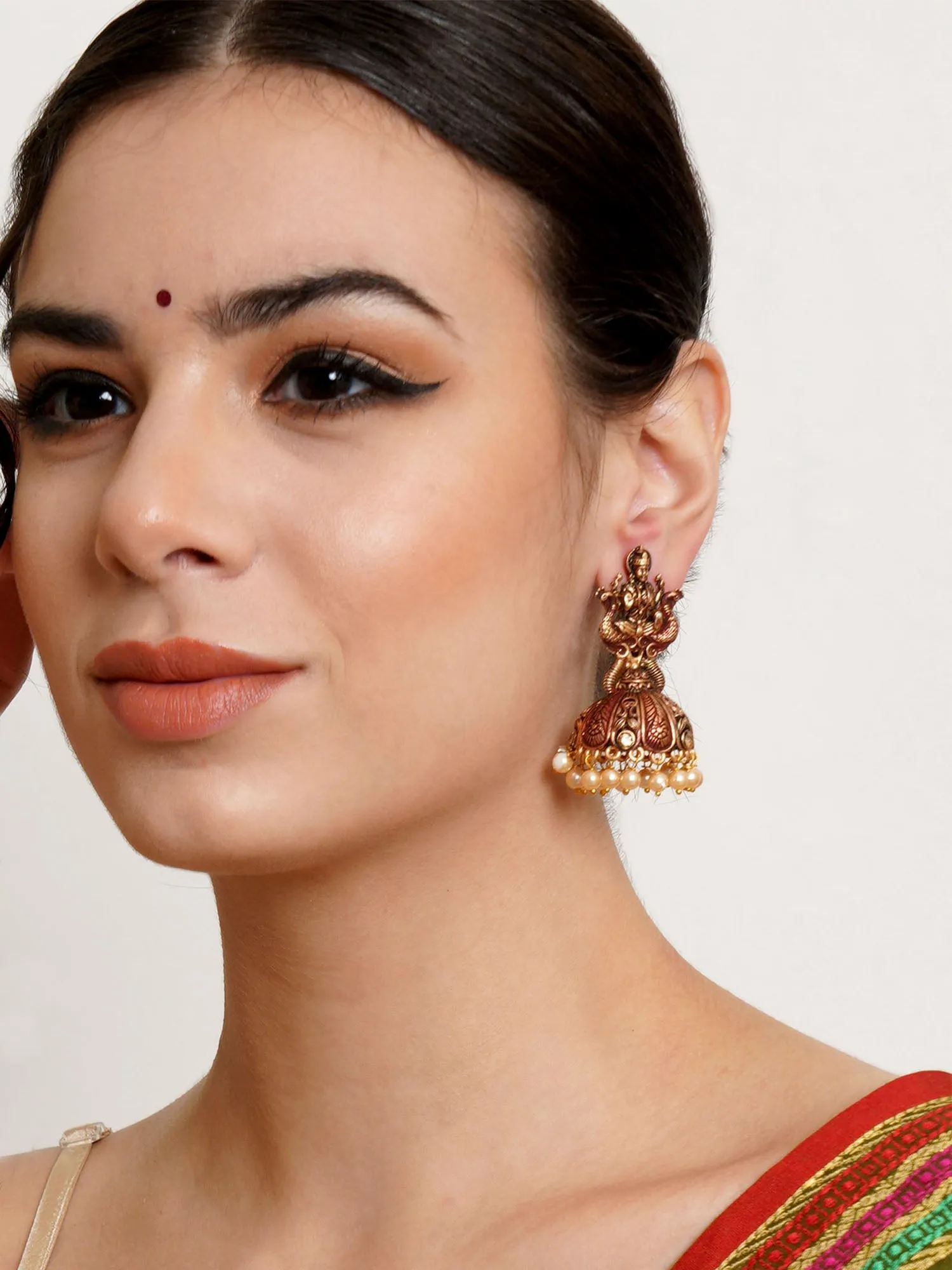 Karatcart Antique Gold Plated Maroon Mata Laxmi Jhumki Earrings for Women